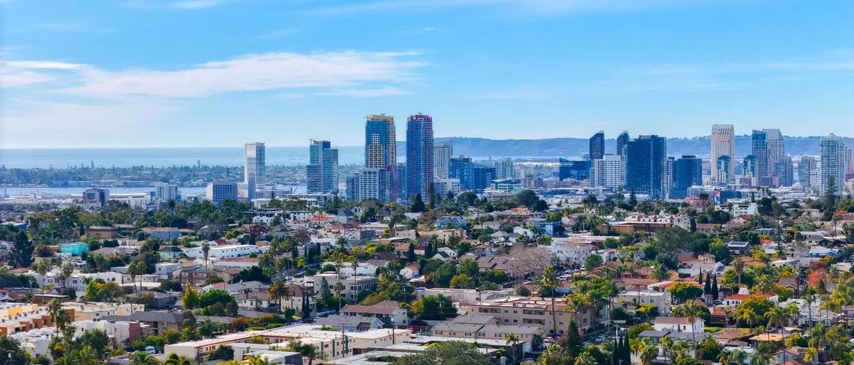 The downtown San Diego skyline seen across the hillside neighborhoods near Hillcrest